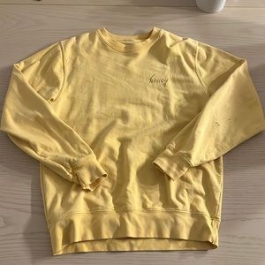 Brandy Melville John Galt honey sweatshirt